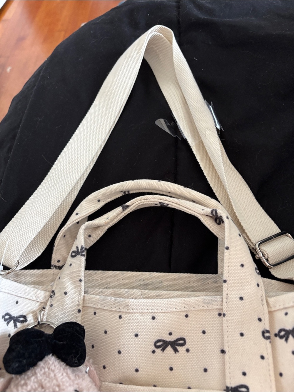 Madden girl. Cream Bow-Print Canvas Tote Bag with Bear Charm. - Picture 11 of 15